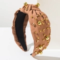 Detail of twisted knot wide headband in camel fabric with golden beads and champagne crystals - Light Coffee