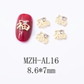 Close-up of golden Fu character nail charms with rhinestones on red manicured nails - Gold Clear Zircon Fortune Style (AL16)