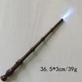 Detail of wizard wand with dark brown wood texture and blue LED light for cosplay - YT Generation 4 Wand - Brown (Glow & Sound)