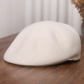 Detailed texture of off-white wool blend flat cap on a rustic wooden table surface - M (56-58cm) / White