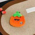 Detail of plush orange persimmon coin purse with happy embroidery and green hook - Happy-Persimmon