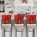 Christmas chair covers featuring embroidered reindeer and trees on red fabric - Christmas Reindeer