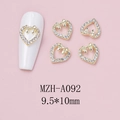 Detail of heart nail charms with gold bows and rhinestones, size 9.5x10mm model MZH-A092 - Gold Heart Center Bowknot Style (A092)