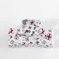 Witte kerst haarklem met feestelijke prints zoals kerstsokken en zuurstokken - Wit Kerstpatroon met Strik