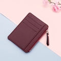 Slim burgundy pebble leather card holder with zipper pocket and multiple slots - Brown