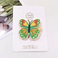 Colorful sequin butterfly hair clip with rainbow glitter on a handmade display card - Green Colorful Butterfly