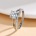 Elegant silver ring with a large round moissanite center stone and pavé diamond band - White Gold Ljz-222 / Adjustable Open