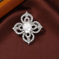 Silver vintage hollow brooch featuring a large oval clear crystal and pave accents - Style 13 (Silver White Flower)