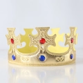 Close-up of golden fabric crown with ruby and sapphire gems for birthday parties - One Size / Gold Cross Crown
