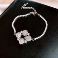 Silbernes Blumenarmband mit schwarzem quadratischem Stein und klaren Kristallen - Armband / Silberschwarz