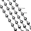 Detail view of 6mm evil eye beads on silver chain with 11mm spacing for DIY jewelry - Black-Steel