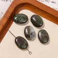 Detailed view of five oval natural stone beads with green and reddish-brown textures - Deep Green Reddish Brown Textured Oval Style (5号)