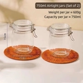 Set of 2 clear 750ml glass storage jars with metal clamp lids on a rattan mat - 2-Piece Set / 750ml