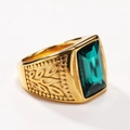 Men's gold titanium ring featuring a large emerald-cut green gemstone with leaf relief - Gold Aqua Green Gem