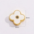 Detailed close-up of 8mm white shell clover pendant with 14K gold titanium steel edges - Four-leaf Clover