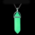 Detailed close-up of a glowing green hexagonal crystal pendant on a silver chain - Pendant with O-Chain / Green