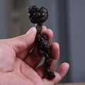 Handcrafted rosewood Lingzhi charm for car keychains, featuring detailed wood carvings - Red Sandalwood Lingzhi Ru Yi