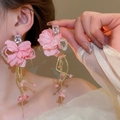 Detail of pink fabric flower earrings with long tassels and zircons on a model - 158# Silver Needle - Pink.
