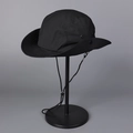 Detail of lightweight black sun hat featuring metal vents and adjustable snap buttons - M(56-58cm) / Black
