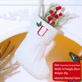 Knitted Christmas stocking in cream white with red embroidered letter U and holly - Letter U / White