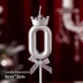 Silver number 0 birthday candle with elegant crown and bow detail, size 6cm x 3cm - Number Candle Crown Bow Silver 0
