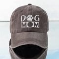 Detail of the Dog Mom embroidery and dog paw motif on a washed cotton baseball cap - One Size / Coffee