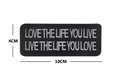 Tactical embroidered morale patch with white lettering on black twill, 10cm x 4cm size - Love the Life You Live