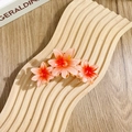 Haarklammer mit drei Frangipani-Blüten in Pink-Orange-Verlauf aus hochwertigem Resin - Dreifache siebenstrahlige Blüten / Wassermelonenrot