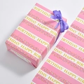 Pink striped Happy Birthday gift wrapping paper with rainbow sprinkles and purple ribbon - Pink Stripe