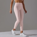 Dettaglio della vita alta senza cuciture sui leggings da yoga rosa chiaro elastici - XS / Rosa chiaro