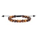 Close-up of natural tiger eye stone beads on a black braided adjustable cord bracelet - 19 Beads Tiger Eye Braided