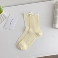 Breathable beige cotton crew socks featuring vertical ribbed texture and rolled cuffs - One Size / Light Yellow