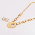 Detail of gold paperclip chain necklace with T-bar clasp and rhinestone circle pendant - Gold