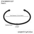 Detailed macro view showing the spring-like screw texture on the black stainless steel bangle - S / Spiral Spring Coil Style (Z161) / Black