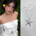 Long collier avec pendentif étoile de mer en argent et texture métallique martelée - Type D Collier Long Grande Étoile de Mer Argentée