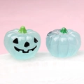 Macro shot of 3D glowing blue pumpkin figurines for Halloween DIY crafts and decorations - Luminous Light Blue (Black Expression)