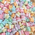 Macro shot of colorful resin butterfly beads for DIY nail art and jewelry making - Patterned Heart Cloud