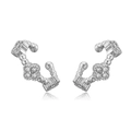 Detailed macro view of silver clover ear cuffs featuring sparkling cubic zirconia pavé - Platinum White Zirconia