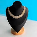 Multi-row gold plated rhinestone necklace on black velvet mannequin stand - Medium Black PU