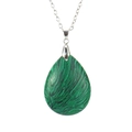 Macro shot of malachite teardrop pendant showing green stripe texture and silver clasp - Synthetic Malachite