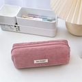 Close-up of pink corduroy pencil case with May Rabbit woven label and zipper detail - Nude Pink
