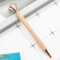 Luxury rose gold ballpoint pen with gold sequins and a large diamond crystal on top - Rose Gold