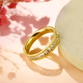Golden titanium steel ring with a full row of clear cubic zirconia on a pink background - US 5 / Gold Single Row