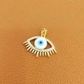 Golden Evil Eye pendant with blue zircon stones on a premium brown leather background - 32-Gold Oval Blue Eye Pave