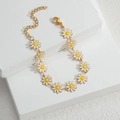 Golden daisy floral bracelet with 12 white enamel flowers and adjustable lobster clasp - 12 White Daisies Bracelet