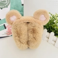 Detail of plush camel ear muffs featuring pink sequin hearts and cute bear ears design - One Size / Khaki