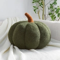 Nordic pumpkin-shaped decorative pillow in dark green plush fabric on a sofa - Green
