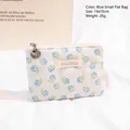 Light blue floral lace cosmetic pouch with shell zipper, size 14x10cm for small makeup items - Blue Flat Bag