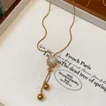 Golden snake chain necklace with sparkling zircon pavé ball and hanging bead tassels - Ball Pendant Tassel Style / 18K Gold Plated Adjustable Pendant Necklace