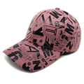 Detailed view of pink baseball cap with black newspaper letter print and curved brim - M (56-58cm) / Pink